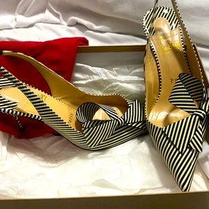 Christian Louboutin heels. Dust bag and box.